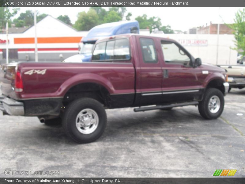 Dark Toreador Red Metallic / Medium Parchment 2000 Ford F250 Super Duty XLT Extended Cab 4x4