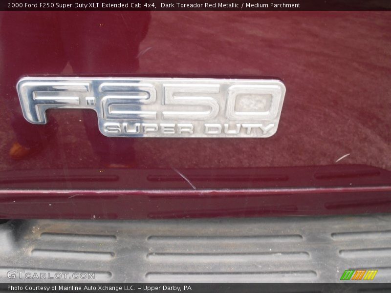 Dark Toreador Red Metallic / Medium Parchment 2000 Ford F250 Super Duty XLT Extended Cab 4x4