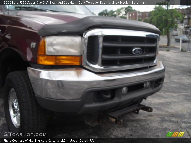 Dark Toreador Red Metallic / Medium Parchment 2000 Ford F250 Super Duty XLT Extended Cab 4x4