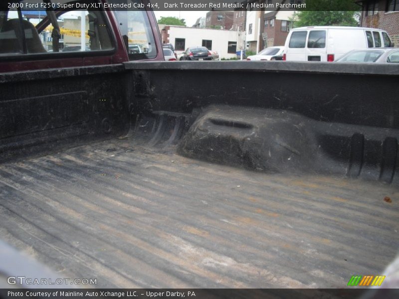 Dark Toreador Red Metallic / Medium Parchment 2000 Ford F250 Super Duty XLT Extended Cab 4x4