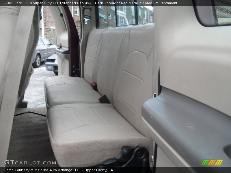 Dark Toreador Red Metallic / Medium Parchment 2000 Ford F250 Super Duty XLT Extended Cab 4x4