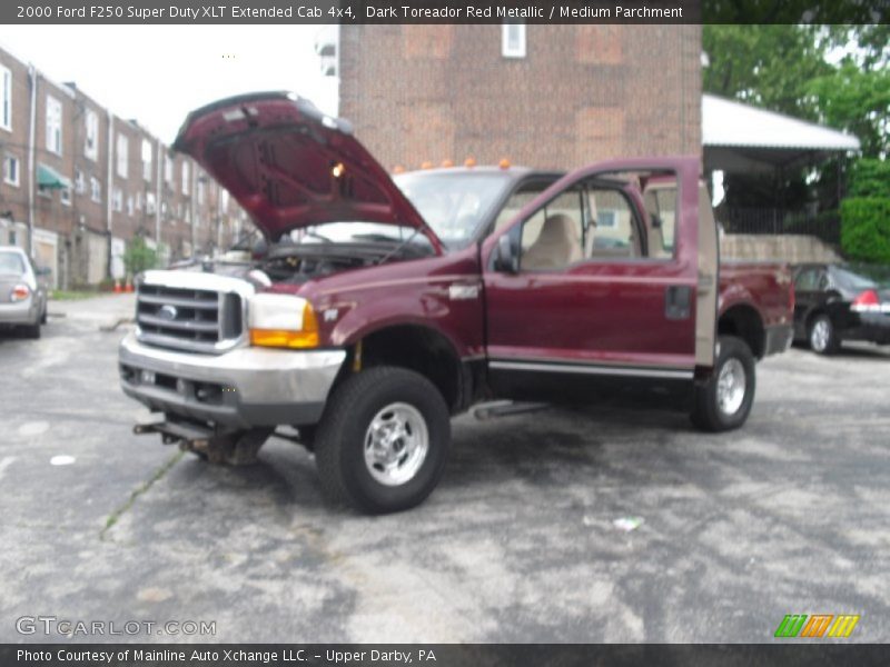 Dark Toreador Red Metallic / Medium Parchment 2000 Ford F250 Super Duty XLT Extended Cab 4x4