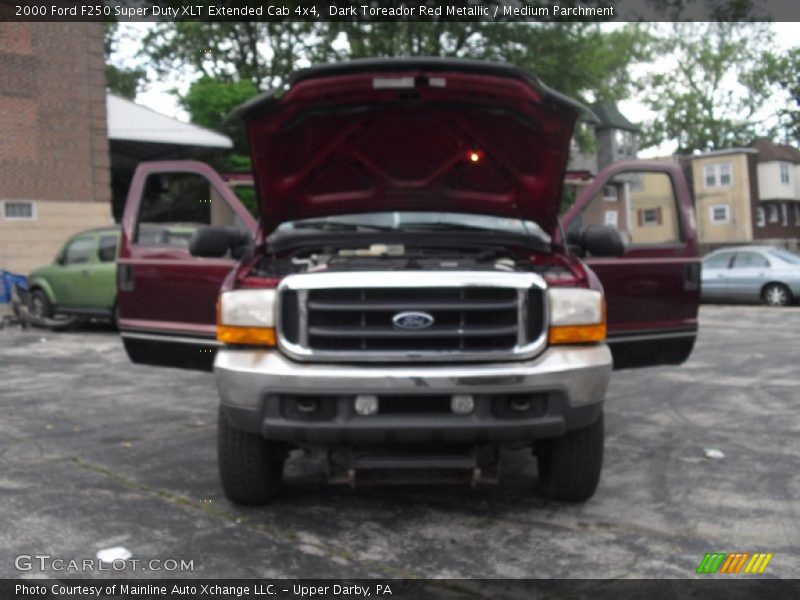 Dark Toreador Red Metallic / Medium Parchment 2000 Ford F250 Super Duty XLT Extended Cab 4x4