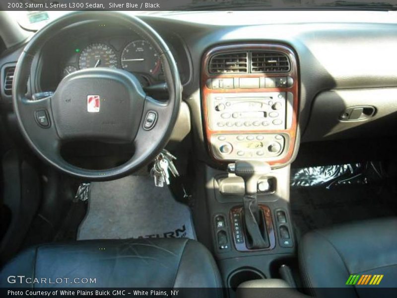 Silver Blue / Black 2002 Saturn L Series L300 Sedan