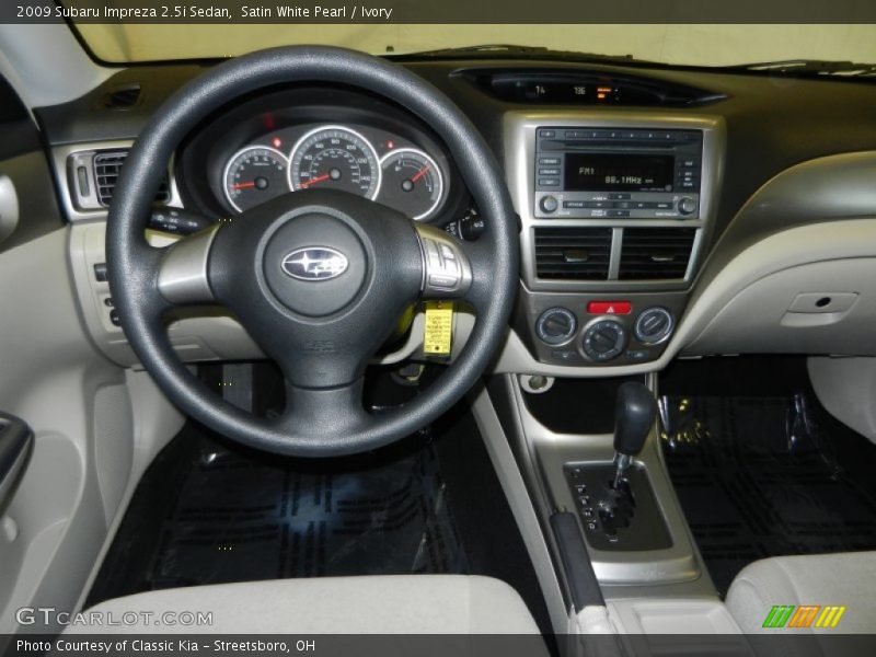 Satin White Pearl / Ivory 2009 Subaru Impreza 2.5i Sedan