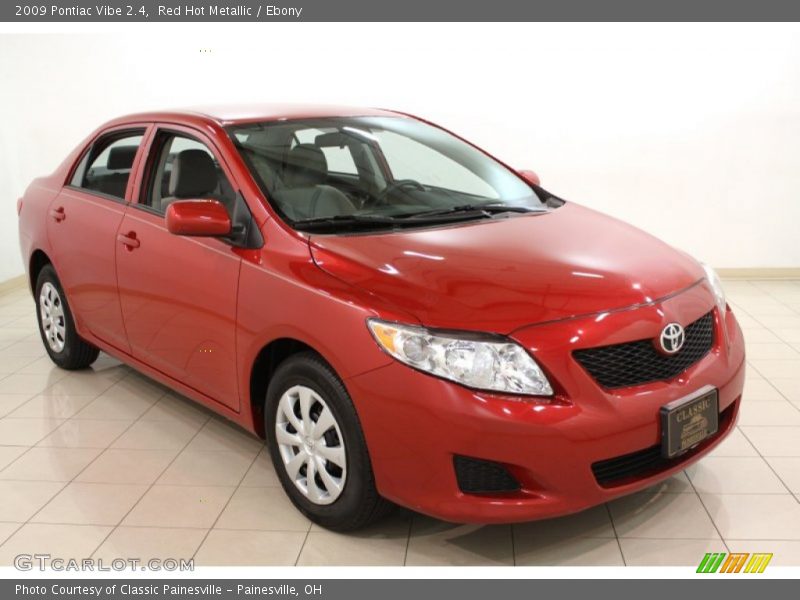 Red Hot Metallic / Ebony 2009 Pontiac Vibe 2.4