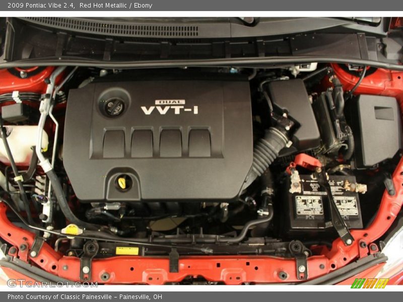 Red Hot Metallic / Ebony 2009 Pontiac Vibe 2.4