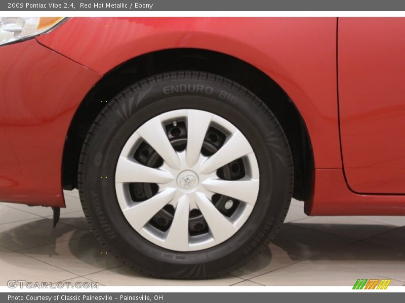 Red Hot Metallic / Ebony 2009 Pontiac Vibe 2.4