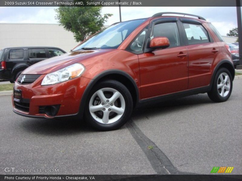 Sunlight Copper Metallic / Black 2009 Suzuki SX4 Crossover Technology AWD