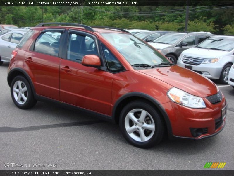 Sunlight Copper Metallic / Black 2009 Suzuki SX4 Crossover Technology AWD