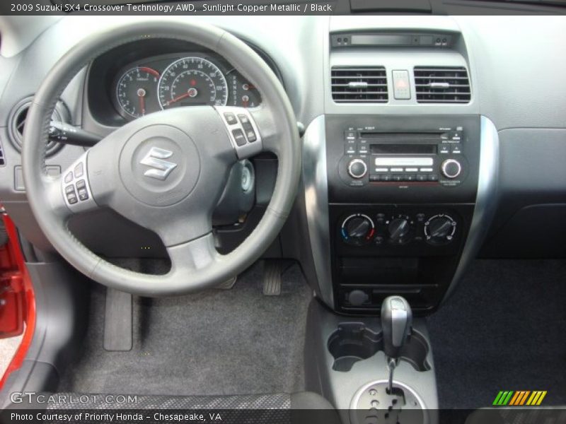 Sunlight Copper Metallic / Black 2009 Suzuki SX4 Crossover Technology AWD