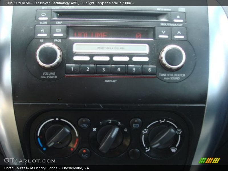 Sunlight Copper Metallic / Black 2009 Suzuki SX4 Crossover Technology AWD