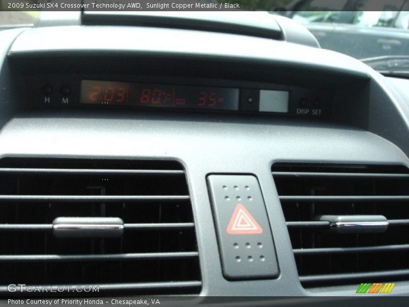 Sunlight Copper Metallic / Black 2009 Suzuki SX4 Crossover Technology AWD