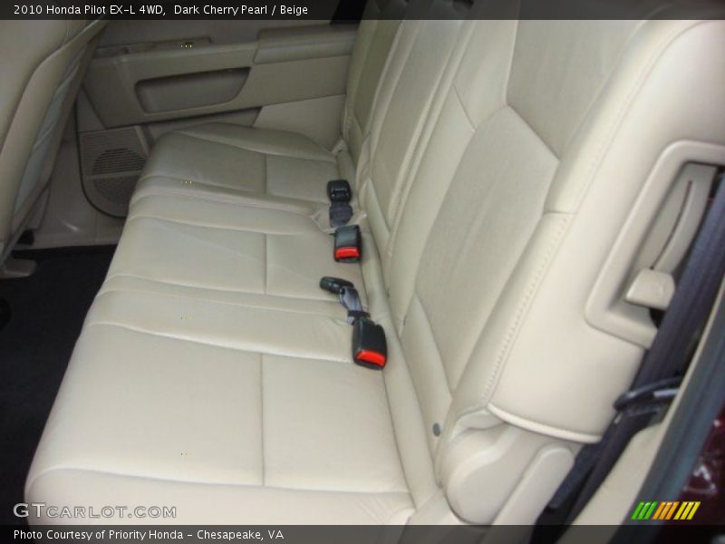 Dark Cherry Pearl / Beige 2010 Honda Pilot EX-L 4WD