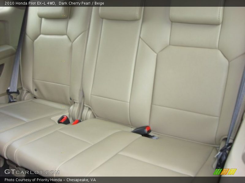 Dark Cherry Pearl / Beige 2010 Honda Pilot EX-L 4WD