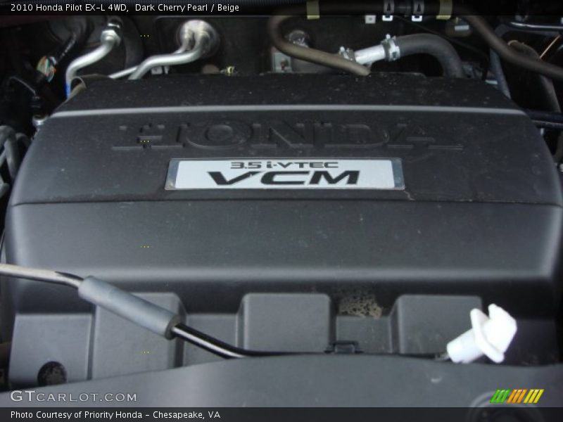 Dark Cherry Pearl / Beige 2010 Honda Pilot EX-L 4WD