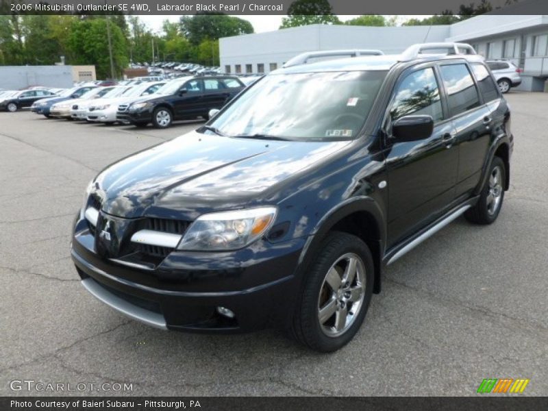 Front 3/4 View of 2006 Outlander SE 4WD