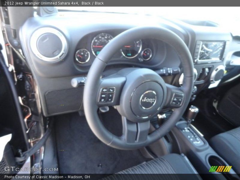 Black / Black 2012 Jeep Wrangler Unlimited Sahara 4x4