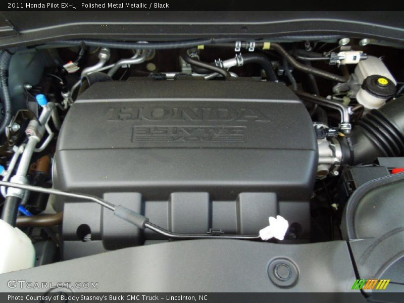 Polished Metal Metallic / Black 2011 Honda Pilot EX-L