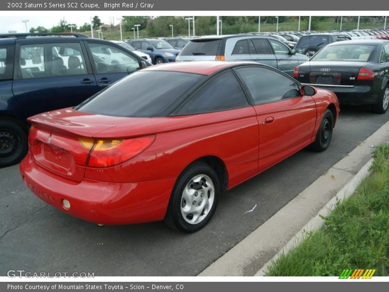 Bright Red / Gray 2002 Saturn S Series SC2 Coupe