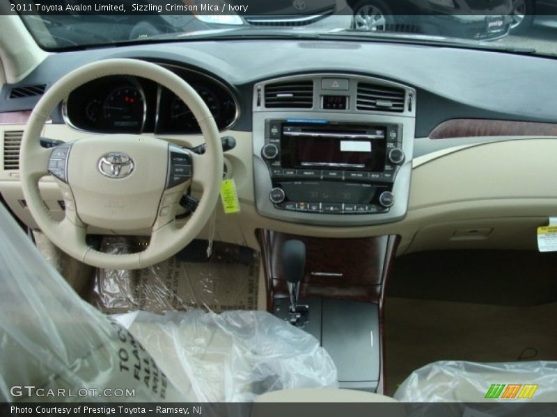 Sizzling Crimson Mica / Ivory 2011 Toyota Avalon Limited
