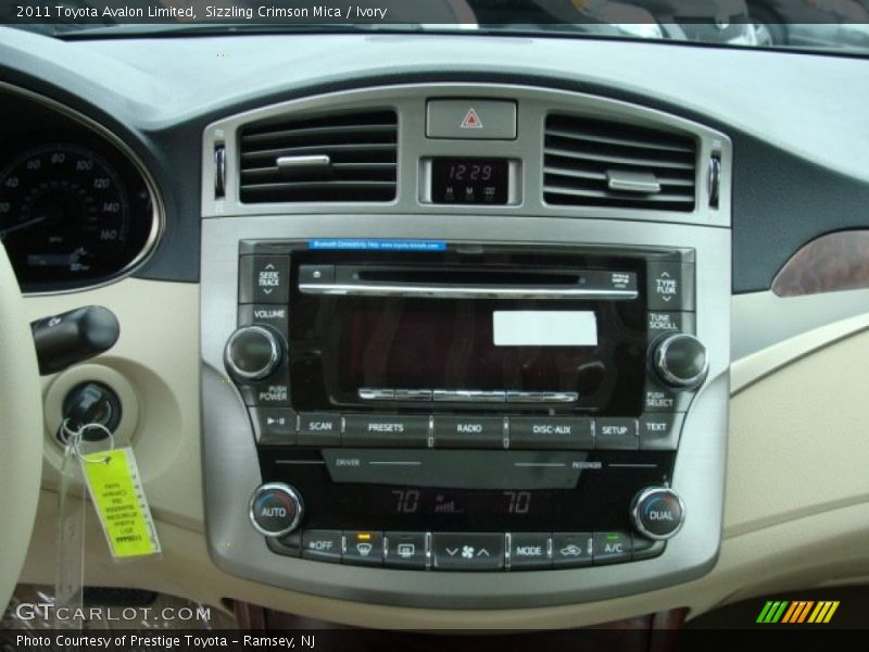 Sizzling Crimson Mica / Ivory 2011 Toyota Avalon Limited