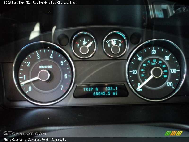 Redfire Metallic / Charcoal Black 2009 Ford Flex SEL