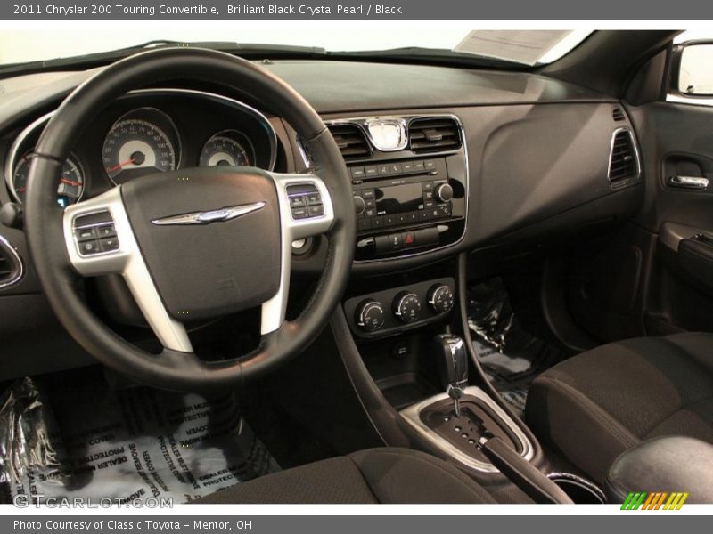 Dashboard of 2011 200 Touring Convertible