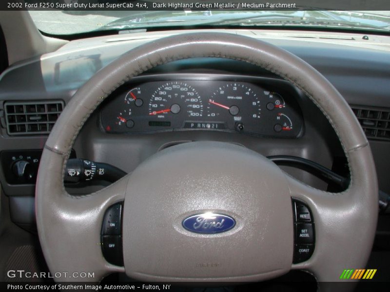 Dark Highland Green Metallic / Medium Parchment 2002 Ford F250 Super Duty Lariat SuperCab 4x4