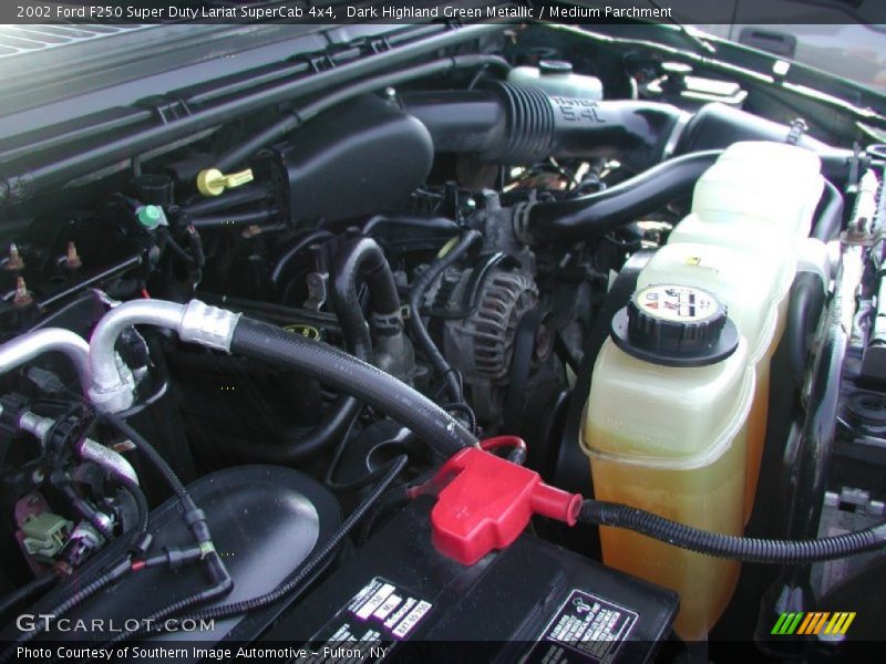 Dark Highland Green Metallic / Medium Parchment 2002 Ford F250 Super Duty Lariat SuperCab 4x4
