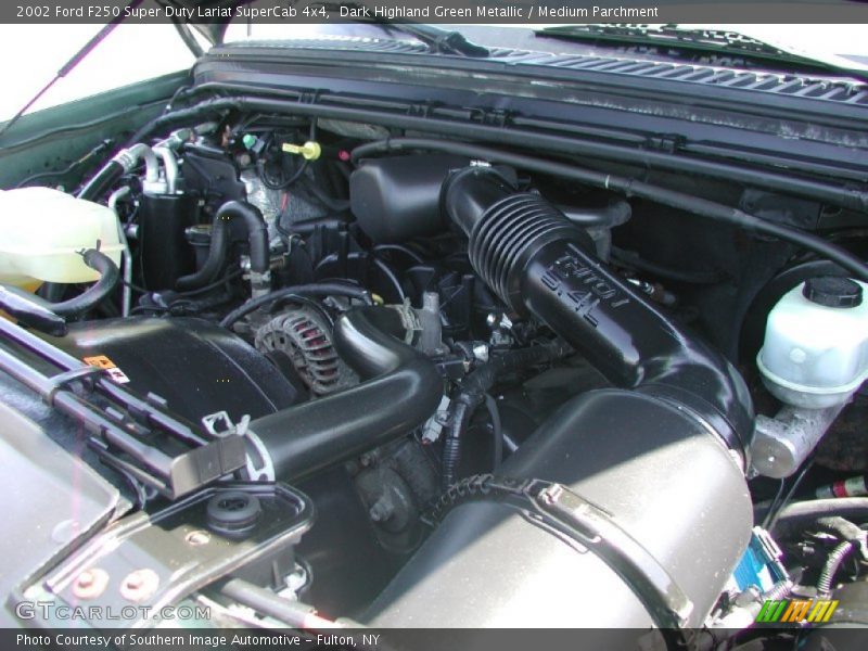 Dark Highland Green Metallic / Medium Parchment 2002 Ford F250 Super Duty Lariat SuperCab 4x4