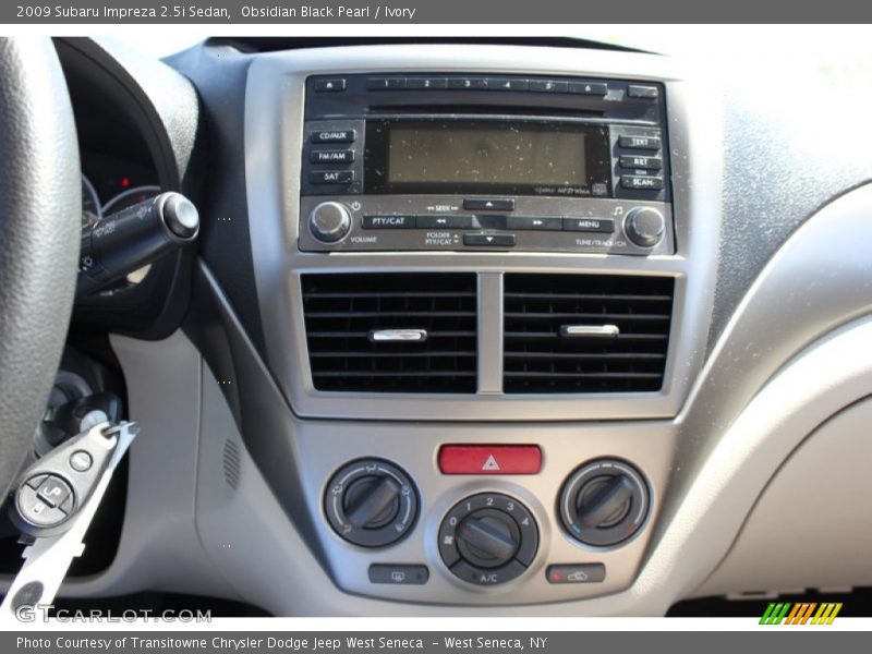 Obsidian Black Pearl / Ivory 2009 Subaru Impreza 2.5i Sedan