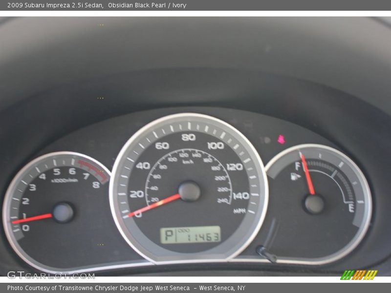 Obsidian Black Pearl / Ivory 2009 Subaru Impreza 2.5i Sedan