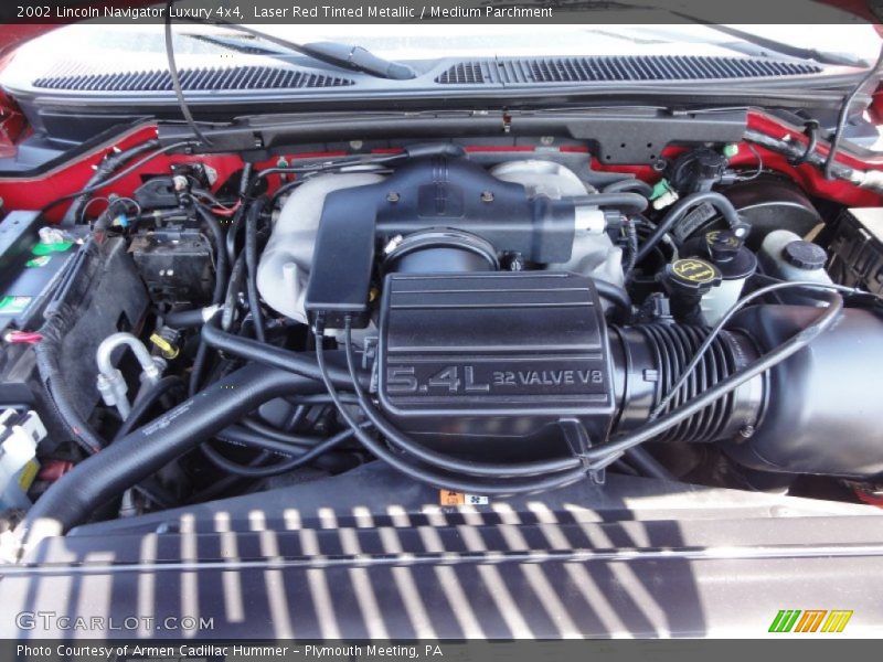 Laser Red Tinted Metallic / Medium Parchment 2002 Lincoln Navigator Luxury 4x4