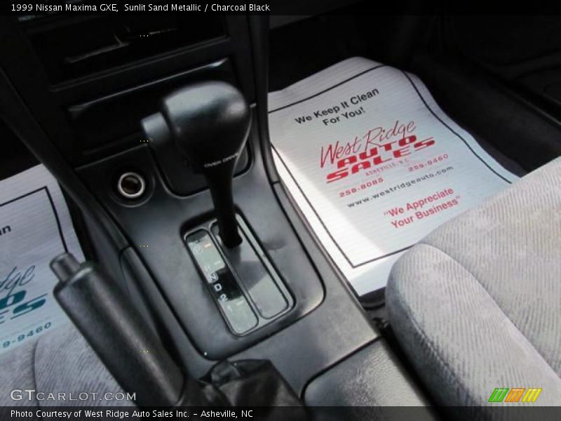 Sunlit Sand Metallic / Charcoal Black 1999 Nissan Maxima GXE