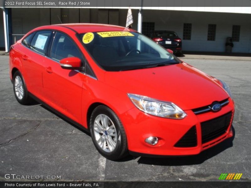 Race Red / Stone 2012 Ford Focus SEL Sedan