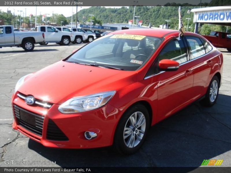 Race Red / Stone 2012 Ford Focus SEL Sedan