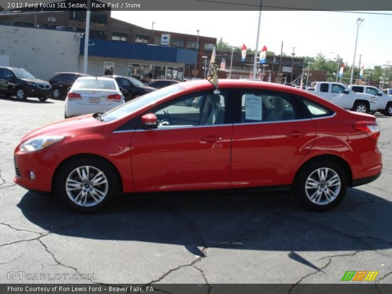 Race Red / Stone 2012 Ford Focus SEL Sedan