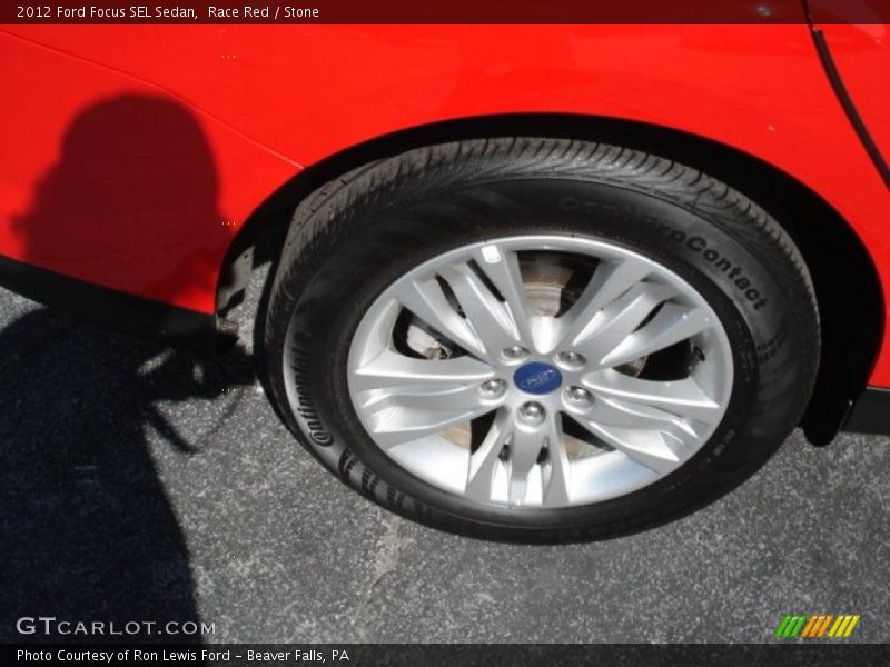 Race Red / Stone 2012 Ford Focus SEL Sedan