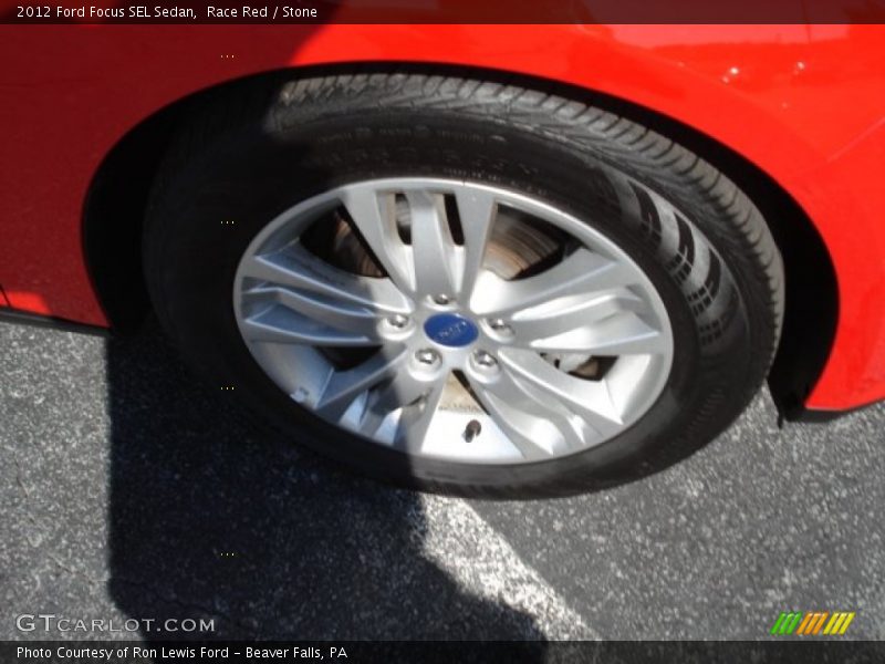 Race Red / Stone 2012 Ford Focus SEL Sedan