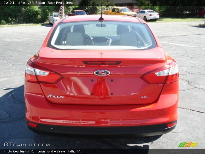 Race Red / Stone 2012 Ford Focus SEL Sedan