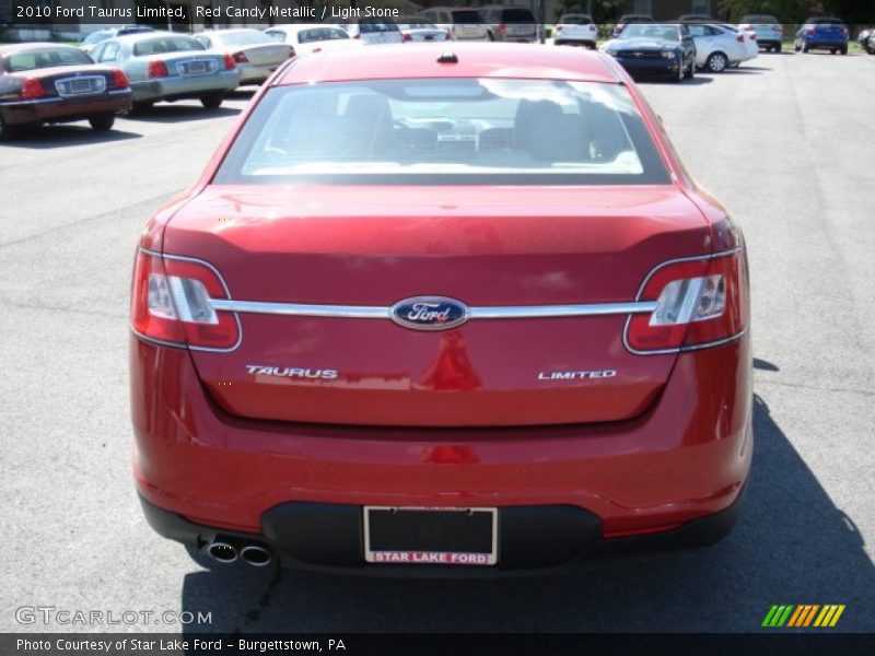 Red Candy Metallic / Light Stone 2010 Ford Taurus Limited