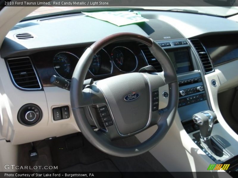 Red Candy Metallic / Light Stone 2010 Ford Taurus Limited