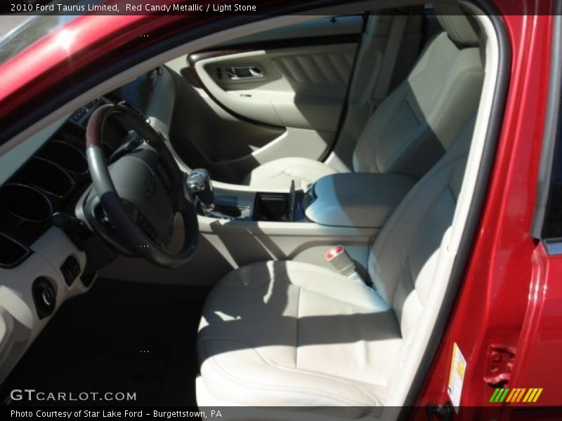 Red Candy Metallic / Light Stone 2010 Ford Taurus Limited
