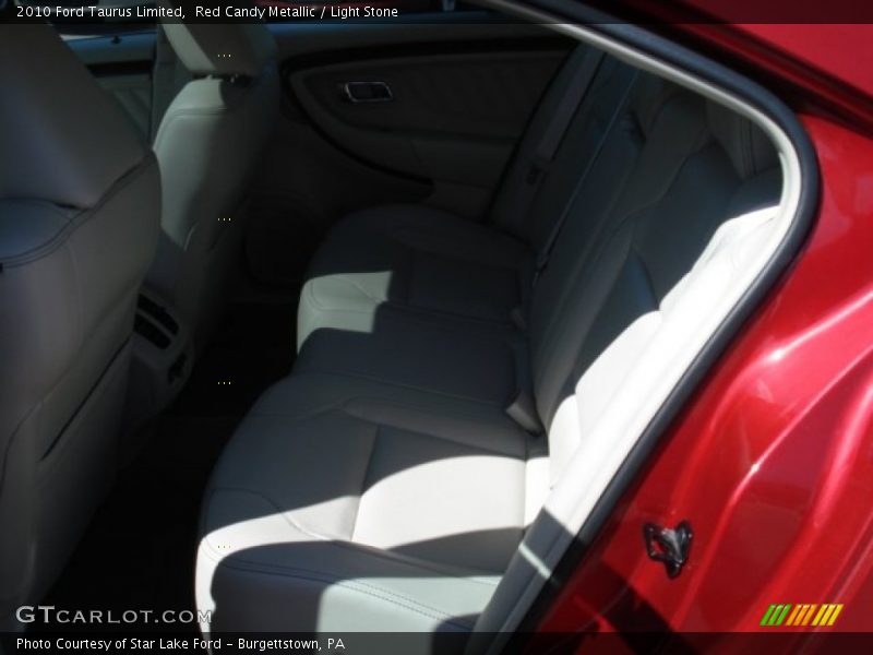 Red Candy Metallic / Light Stone 2010 Ford Taurus Limited