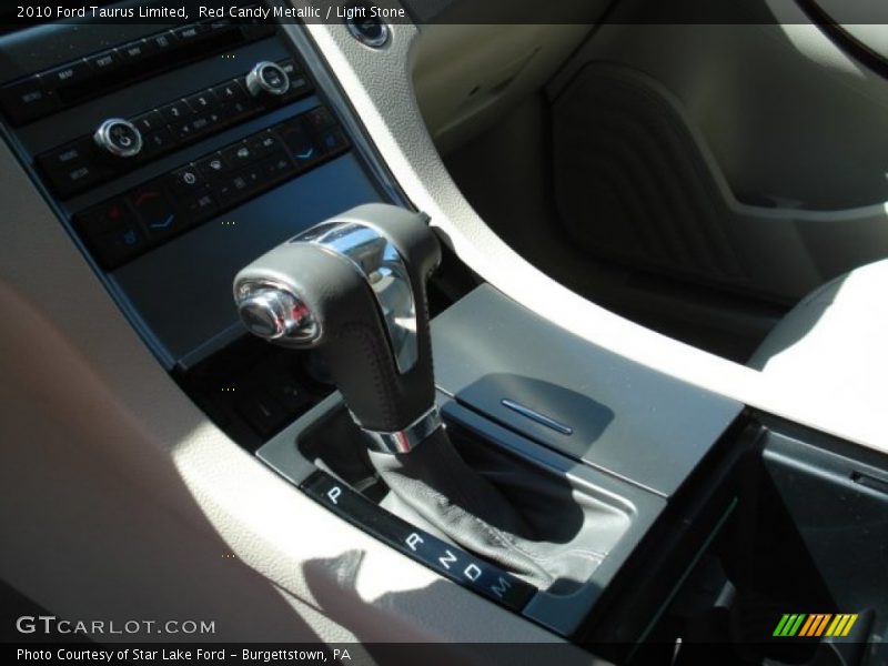 Red Candy Metallic / Light Stone 2010 Ford Taurus Limited
