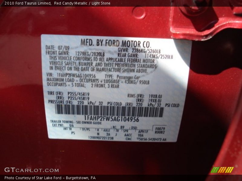 Red Candy Metallic / Light Stone 2010 Ford Taurus Limited