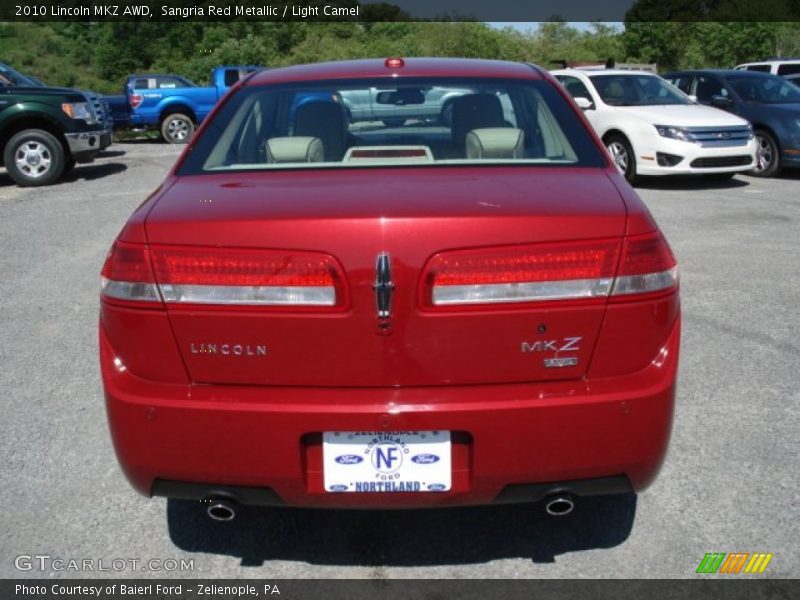 Sangria Red Metallic / Light Camel 2010 Lincoln MKZ AWD