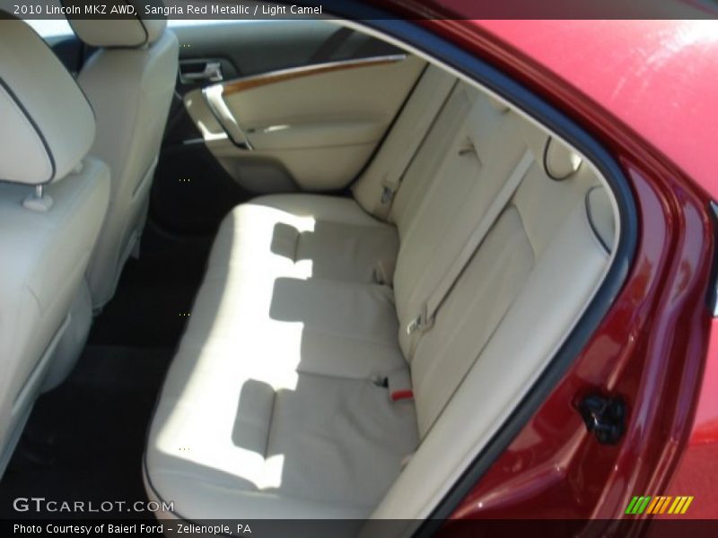 Sangria Red Metallic / Light Camel 2010 Lincoln MKZ AWD