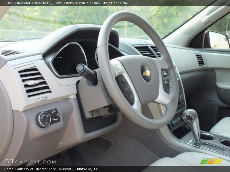 Dark Cherry Metallic / Dark Gray/Light Gray 2009 Chevrolet Traverse LT